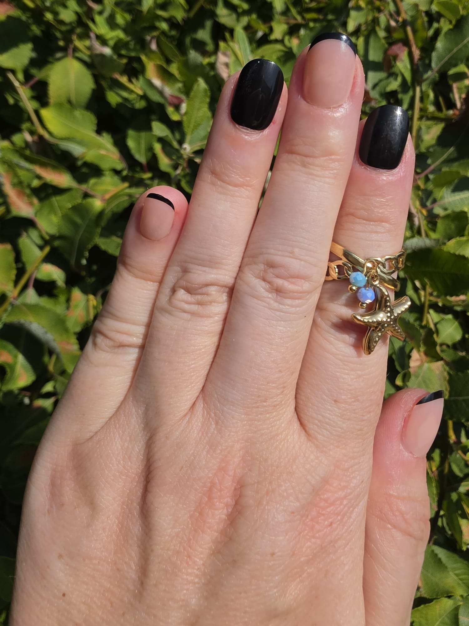 Gold Ring mit Seestern-Anhänger und blauen Opal-Steinen