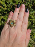 Gold Ring mit großem Blumen-Design im Vintage-Stil und türkisem Stein