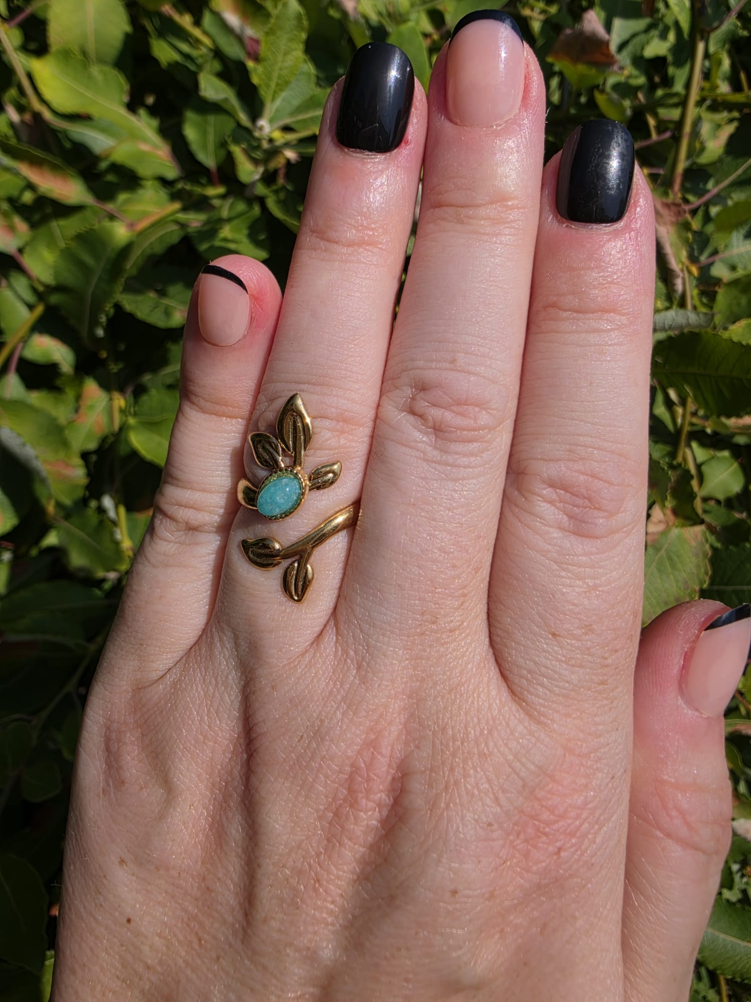 Gold Ring mit Zweig-Design und ovalem türkisem Stein