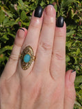 Gold Ring mit Filigran-Design und ovalem türkisem Stein