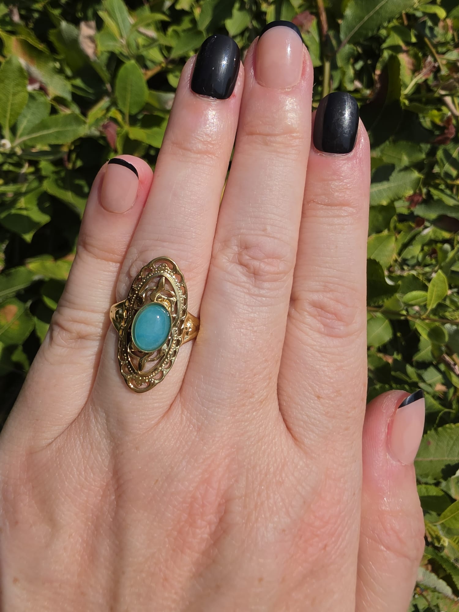 Gold Ring mit Filigran-Design und ovalem türkisem Stein